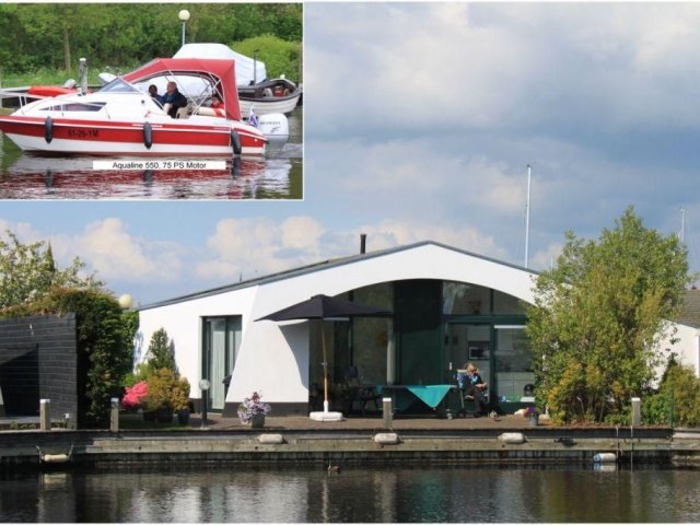 Haus Aquaronde mit Sportboot